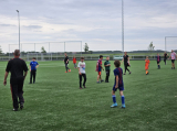 Laatste training S.K.N.W.K. JO11-1JM (partijtje tegen de ouders) van maandag 27 mei 2024 (13/137)